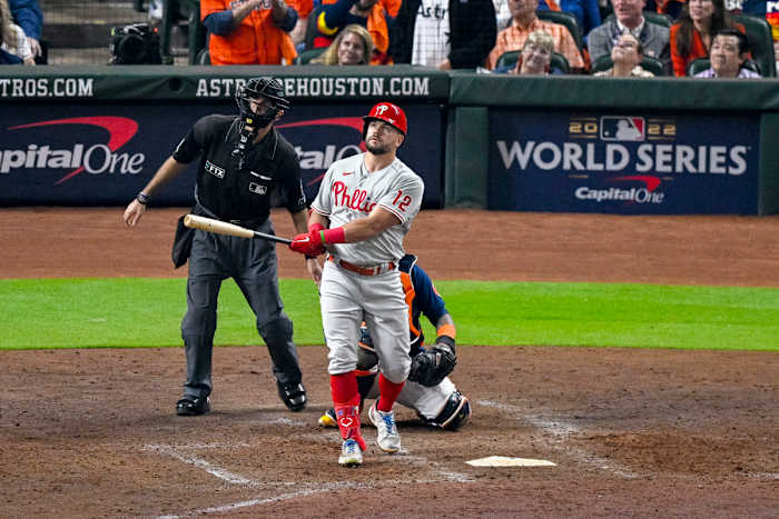 Phillies left fielder Kyle Schwarber and home plate umpire Pat Hoberg watch as a ball hit by Schwarber goes foul.